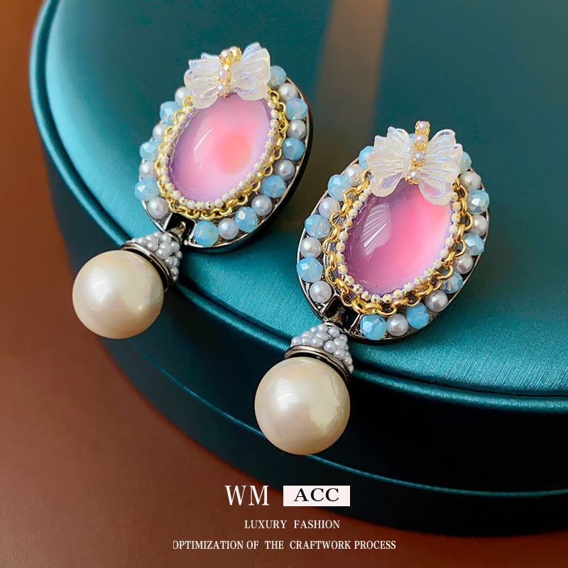 Orecchini a farfalla vintage in resina con cristalli e perle su base in lega placcata argento da donna