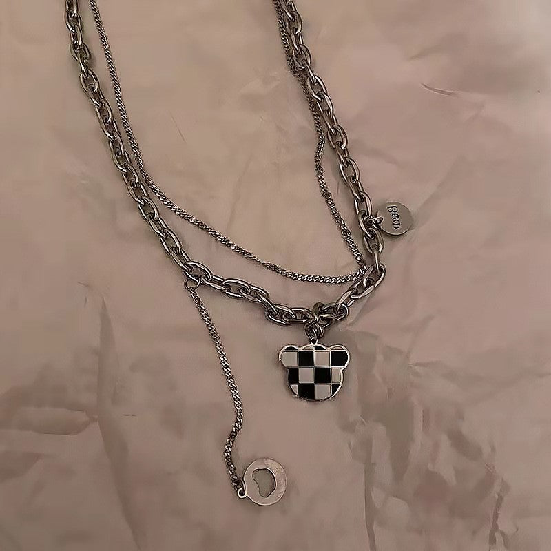 Collana minimalista a doppio strato in acciaio al titanio a quadri con orsetto per uomo e donna con finitura placcata