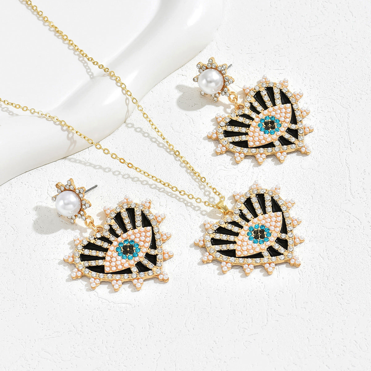 Parure di collana con pendente a occhio turco e orecchini a perno con intarsio di strass per donna, design a cuore e a goccia in lega, stile hip hop retrò