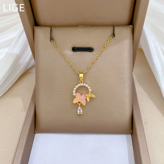 Elegant Pearl Butterfly Pendant Necklace for Women Stainless Steel Delicate Clavicle Chain with Rhinestone Accents Geometric Design