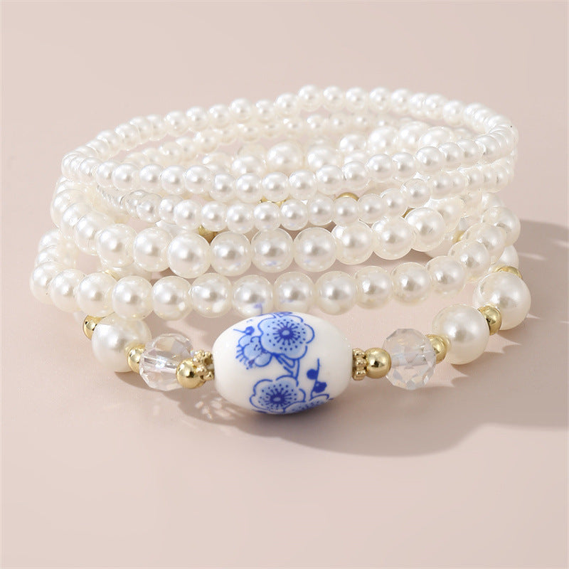 Conjunto de pulseras minimalistas florales vintage francesas para niñas hechas a mano con perlas de imitación y cuentas de cerámica, regalo elegante para cumpleaños o recuerdo de viaje