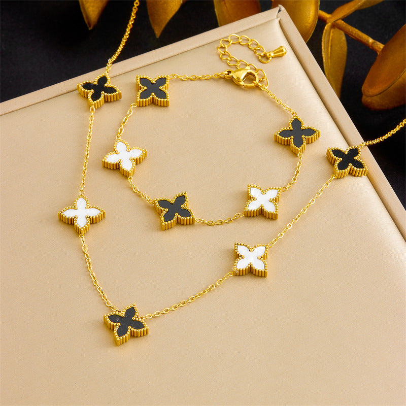 Minimalist Reversible Black and White Four-Leaf Flower Stainless Steel Plated Necklace and Bracelet Set for Women