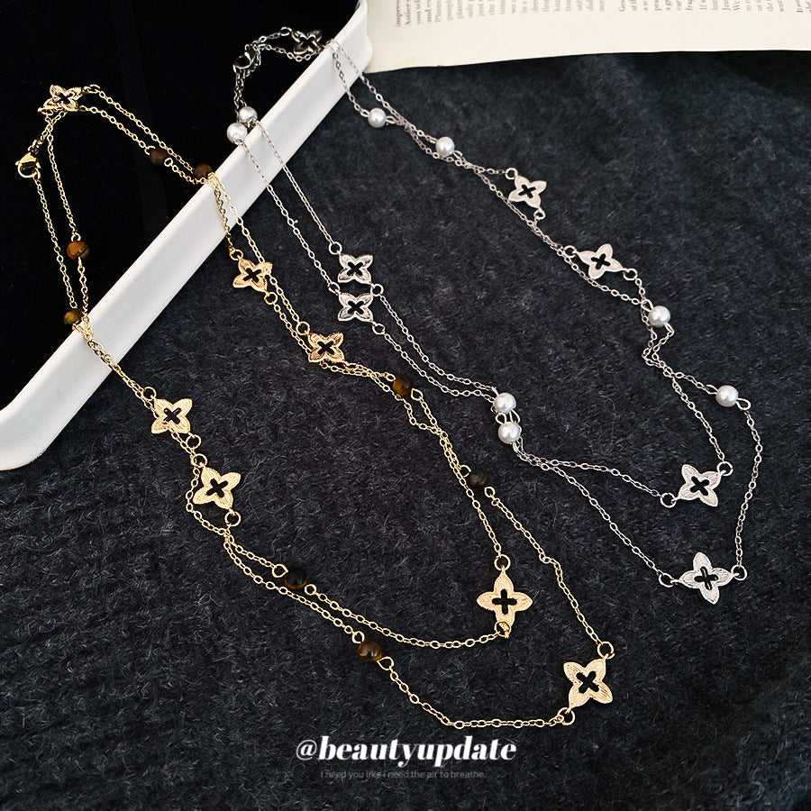 Collana pendente floreale da donna minimalista ed elegante con occhio di tigre e perle, in lega placcata oro, stile catena per maglione, per tutti i giorni