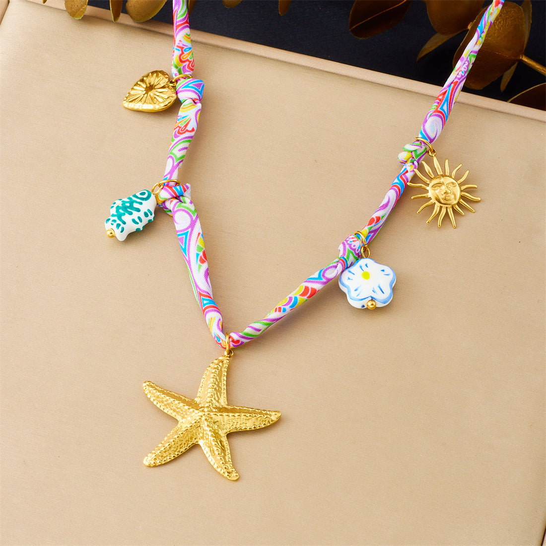 Elegant Gold Plated Stainless Steel Star and Animal Pendant Necklace with Ceramic Fish and Sunflower Charms
