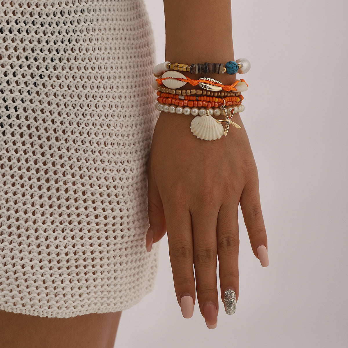 Set di braccialetti bohémien fatti a mano con perline e ciondoli a conchiglia e stella marina, base in lega con perle simulate e perline in vetro