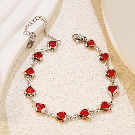 Elegante set collana e bracciale in acciaio inossidabile con zirconi cubici a cuore per donna