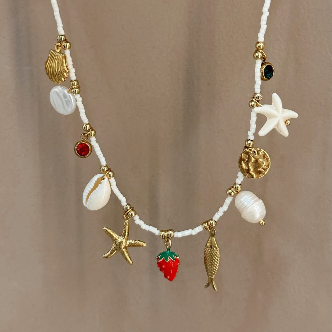 Bohemian Beach Shell Necklace with Starfish and Conch Pendant in Stainless Steel with Plated Finish