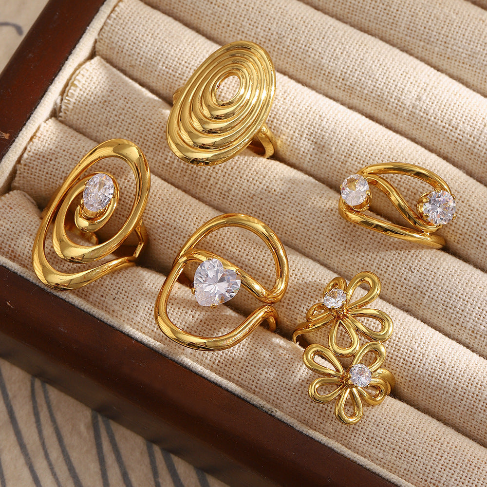 Anillo Minimalista Geométrico de Acero Inoxidable con Baño de Oro de 18K y Detalles Florales en Espiral de Circonita para Mujer