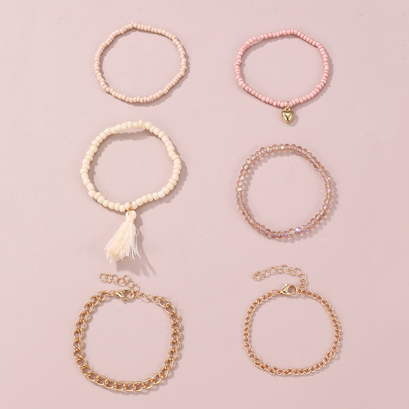 Set di braccialetti minimalisti con perline di vetro a forma di cuore per ragazze, con dettagli in perle e manifattura artigianale