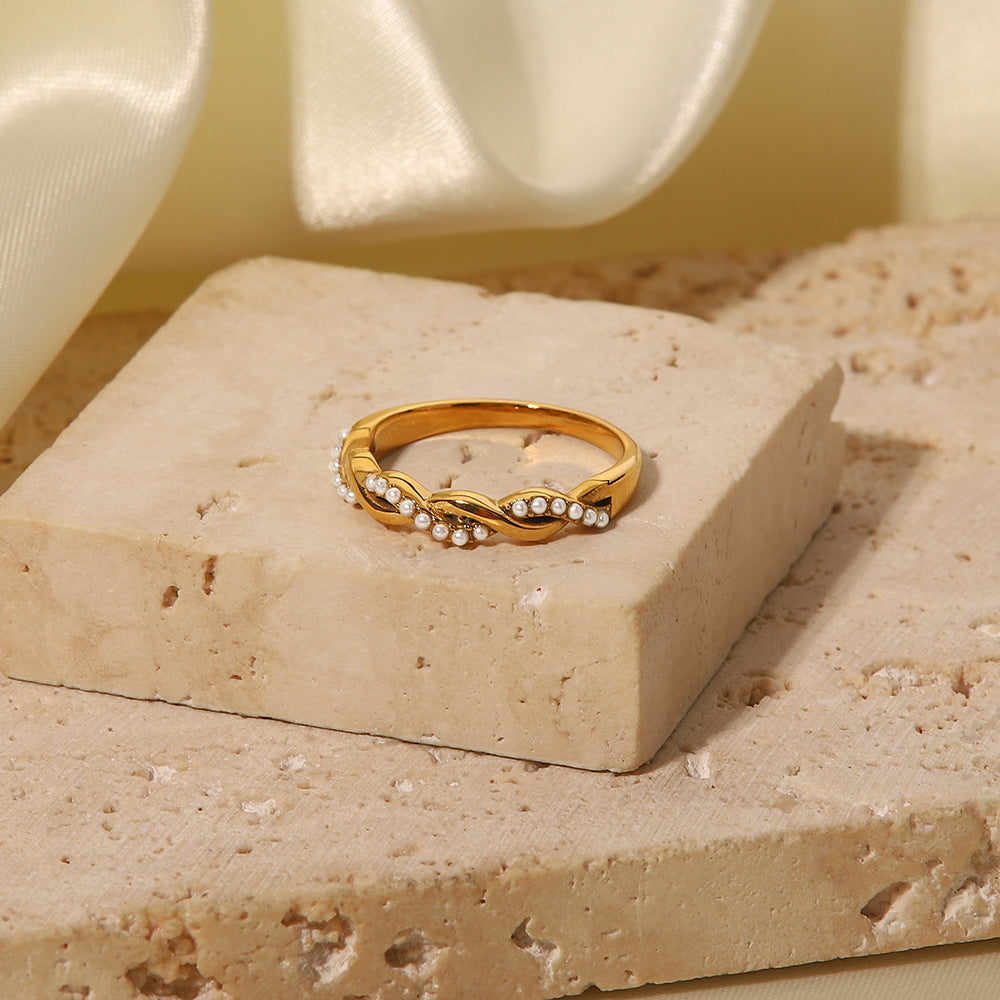 Anello Minimalista Geometrico in Acciaio al Titanio con Intarsio di Perle per Donna Anello a Fascia Intrecciata Annodata di Tendenza
