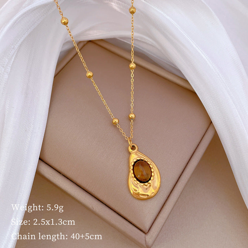 Collana con pendente geometrico minimalista in titanio e acciaio placcato unisex