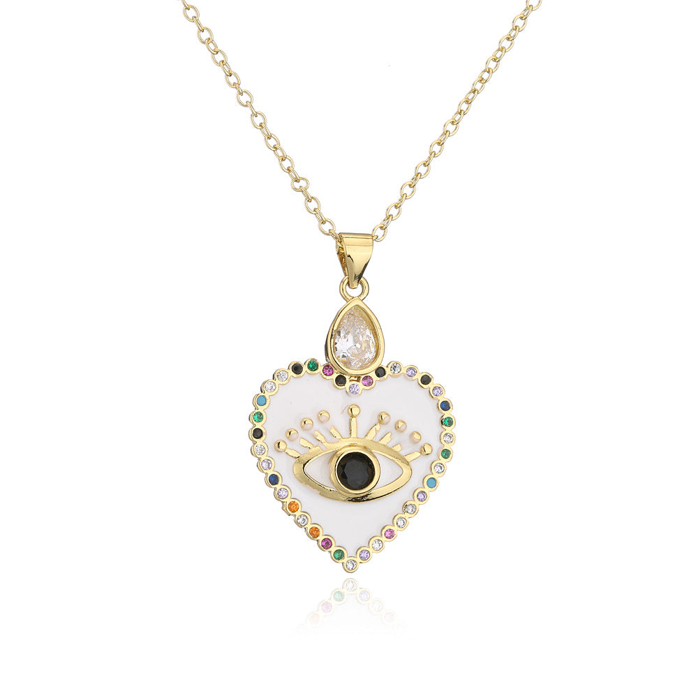 Minimalist Hollow Heart Pendant Necklace in Copper with 18K Gold Plating and Enamel Finish, Accented with Zircon Eyes