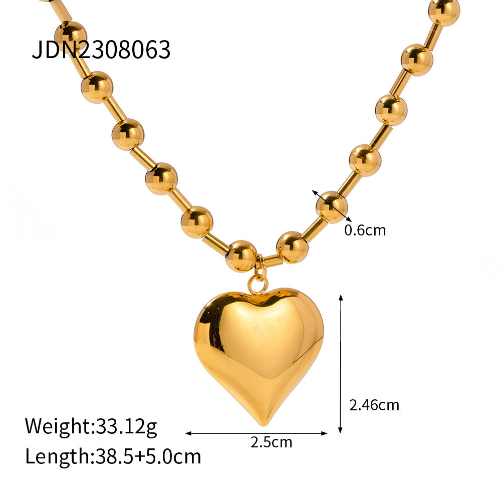 Elegante collana con ciondolo a forma di cuore in acciaio inossidabile con finitura placcata per donna, catena clavicolare minimalista