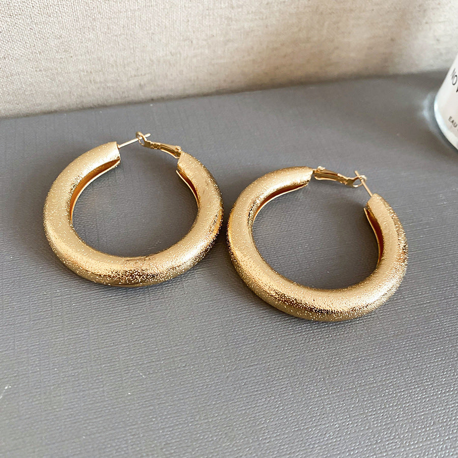 Pendientes de aro redondos geométricos minimalistas para mujer con alambre de acero galvanizado y acabado de metal pulido