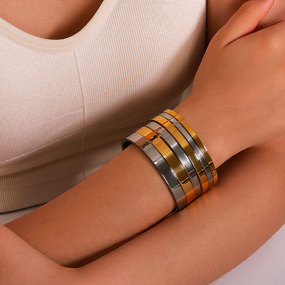 Minimalist Stainless Steel Bracelet with 18K Gold Plating Geometric Round Oval Ring Design for Women