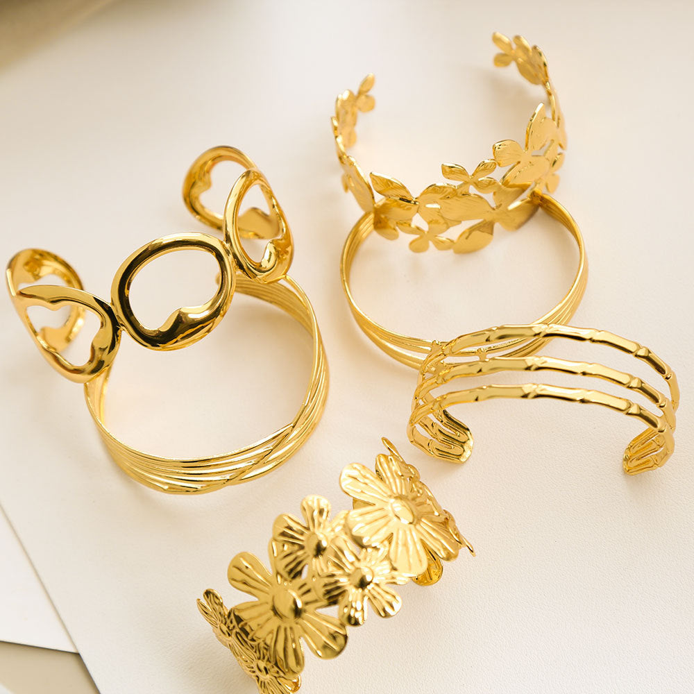 Bracciale Minimalista Ispirato alla Francia in Acciaio Inossidabile con Trafori a Motivi Floreali di Foglie e Girasoli