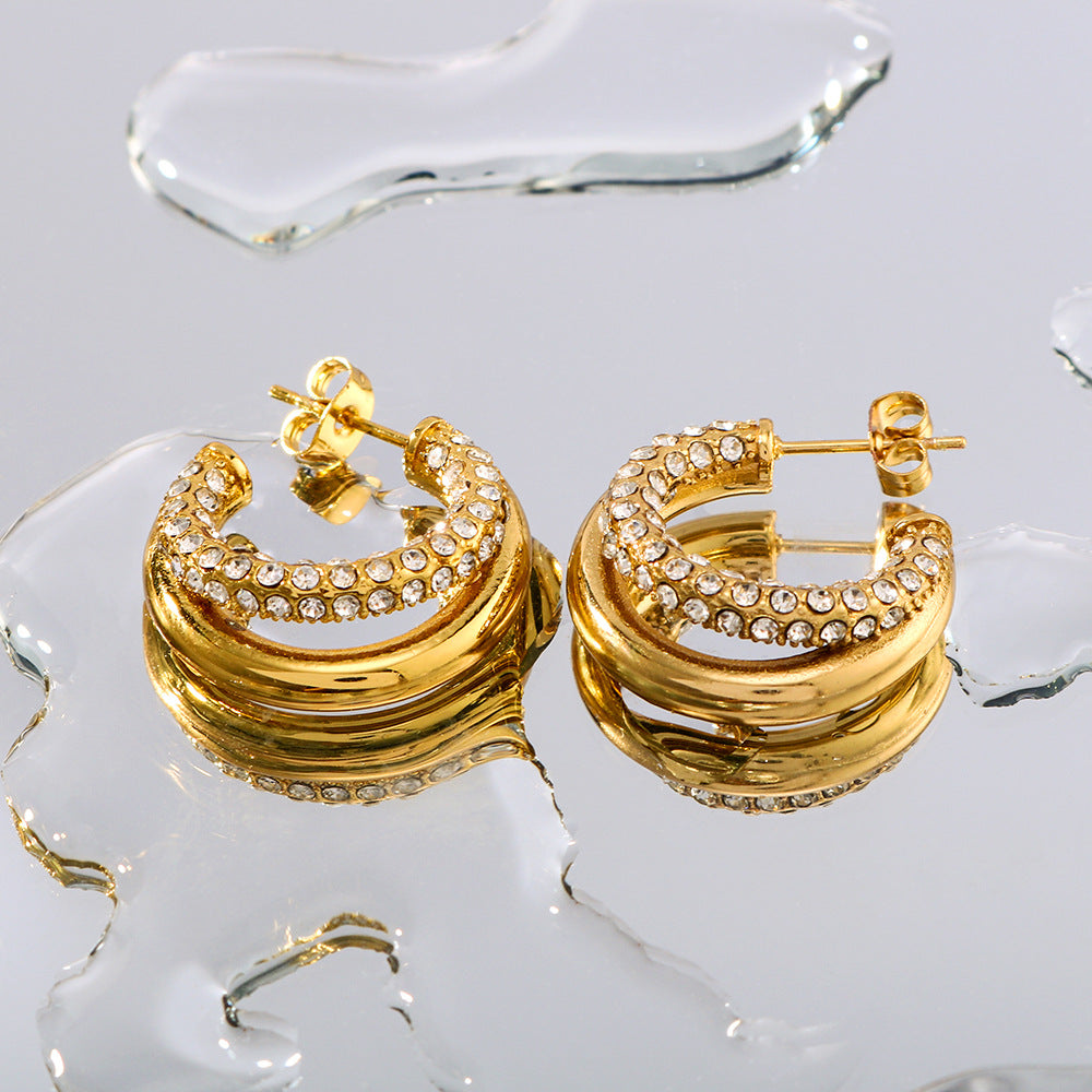Aretes minimalistas de acero de titanio geométricos con baño de oro de 18 quilates y detalles de diamantes de imitación para mujer