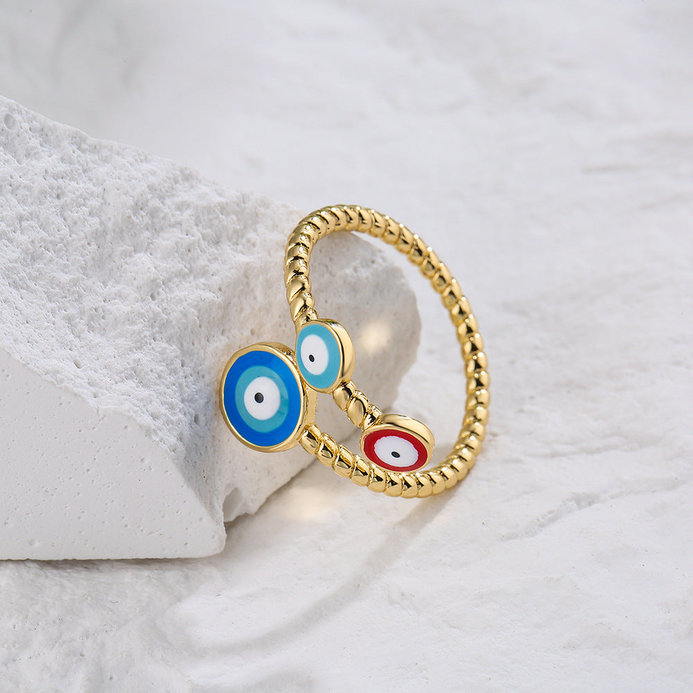 Minimalist Geometric Open Ring for Women in Brass with Gold Plating and Enamel Eye Detail