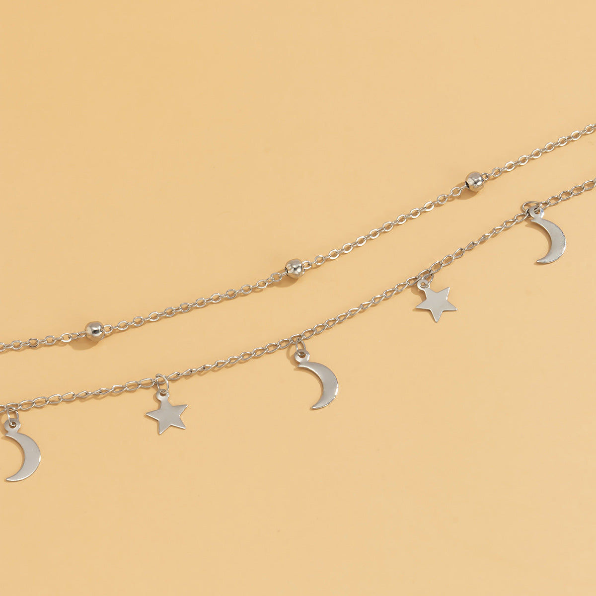 Minimalist Star and Moon Pendant Necklace with Tassel Detail on Delicate Ball Chain for Women