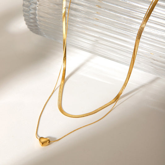 Collana da donna a doppio strato con ciondolo a cuore in acciaio inossidabile placcato oro 18 carati, stile minimalista Ins, con catena a serpente piatta