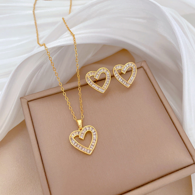 Set di collana e orecchini a cuore geometrici in acciaio al titanio di lusso con strass e zirconi da donna