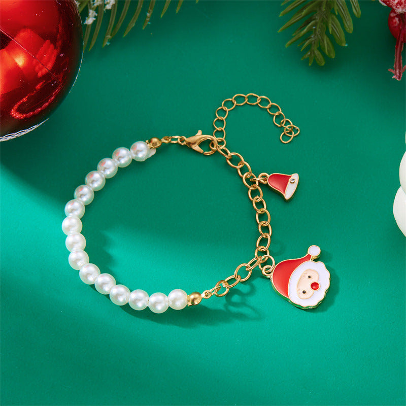 Pulsera de abalorios de Papá Noel de moda para mujer, chapada en aleación con acabado de esmalte, diseño de personaje de dibujos animados, joyería temática navideña
