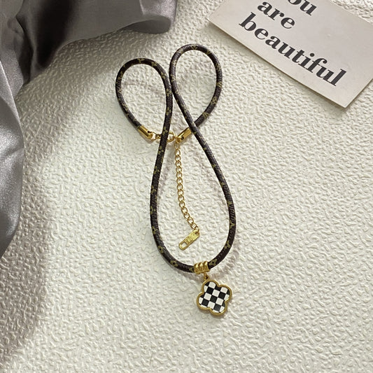 Fashion Minimalist Luxury Gold Plated Titanium Steel Black and White Checkered Clover Necklace for Unisex