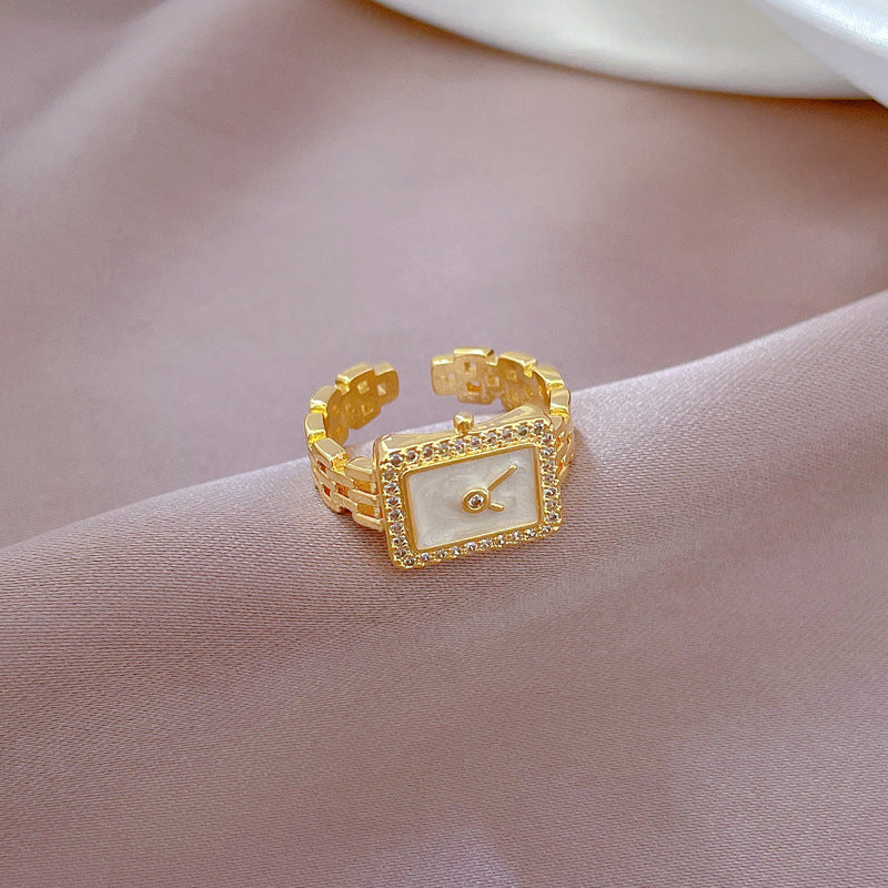 Anillo ajustable minimalista con incrustaciones de diamantes de imitación con diseño de corona para mujer, base de latón con chapado en oro