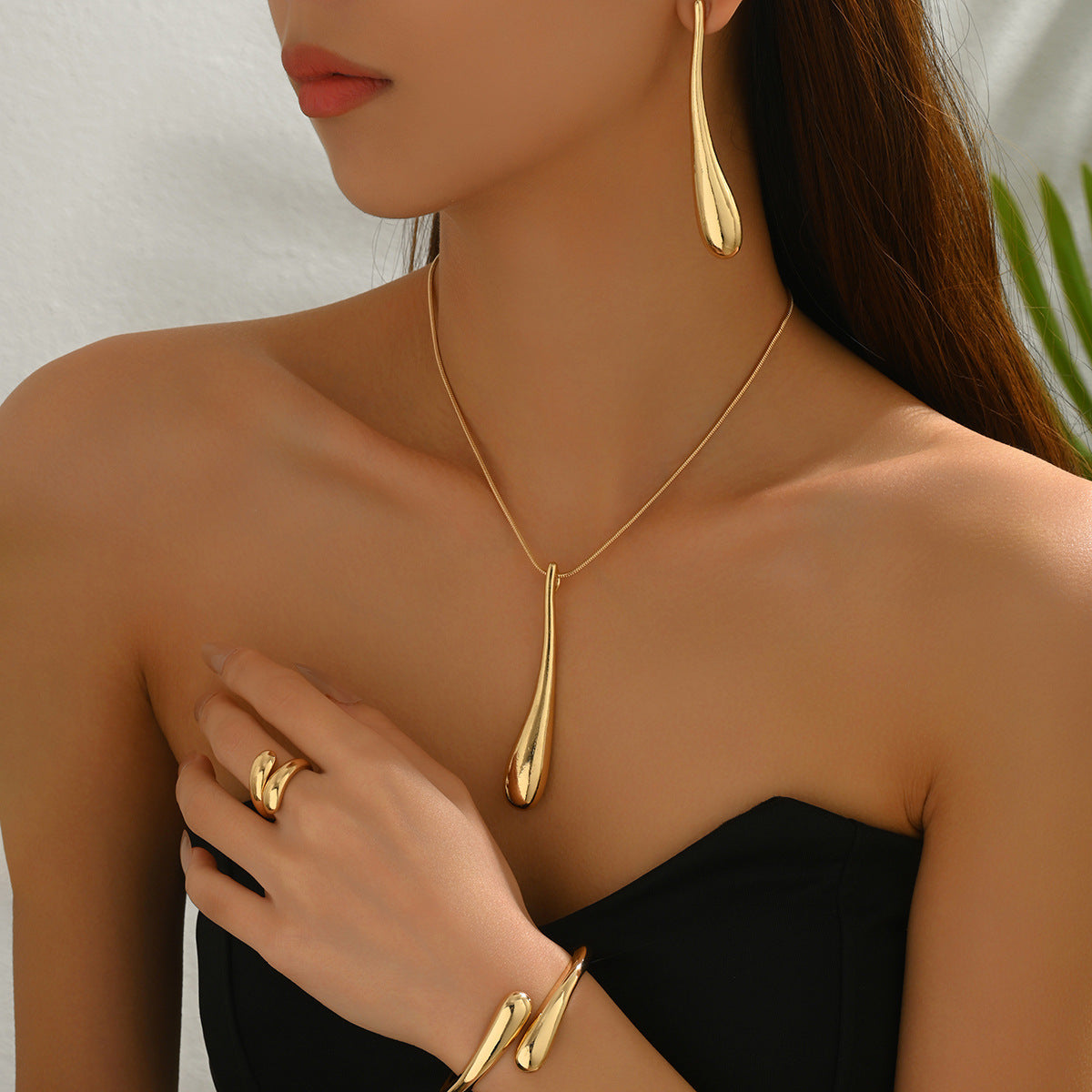 Conjunto de collar de aleación pulida con diseño de gota de agua geométrica para mujer con pendientes, pulsera y anillo a juego