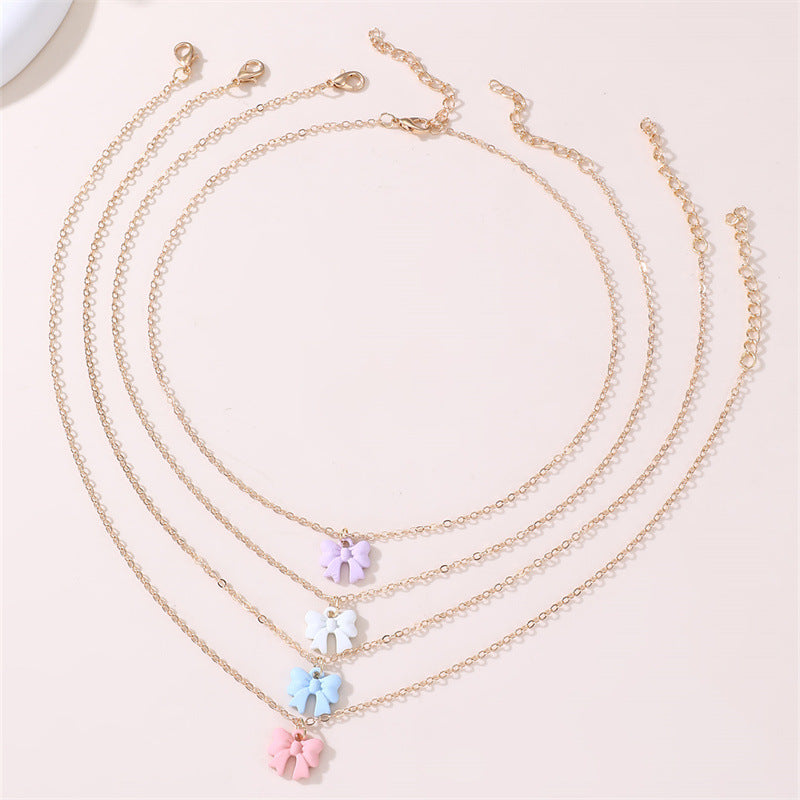 Collar de Cristal con Forma de Lazo Dulce y Fresco para Niñas con Colgante de Aleación y Acabado Hecho a Mano