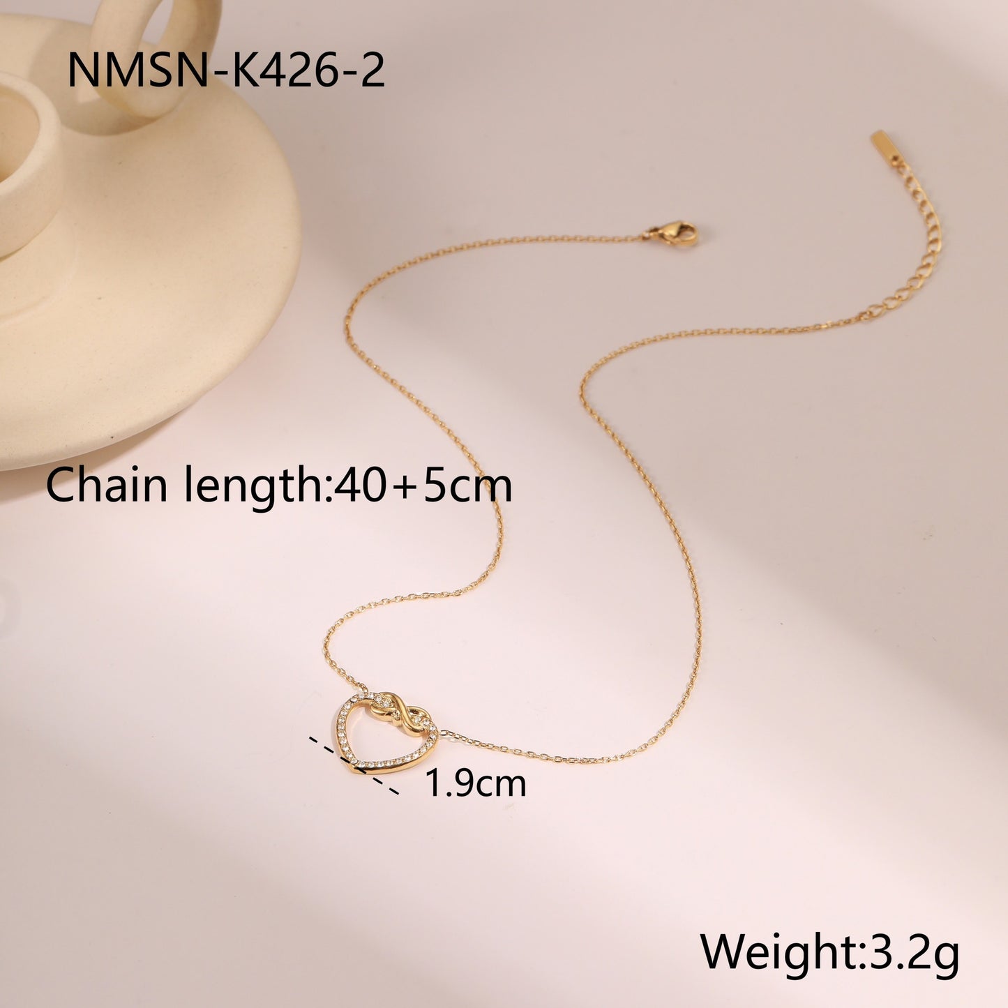 Elegante collar con colgante de corazón hueco de acero inoxidable con incrustaciones de pedrería para mujer, acabado chapado, delicada cadena para la clavícula
