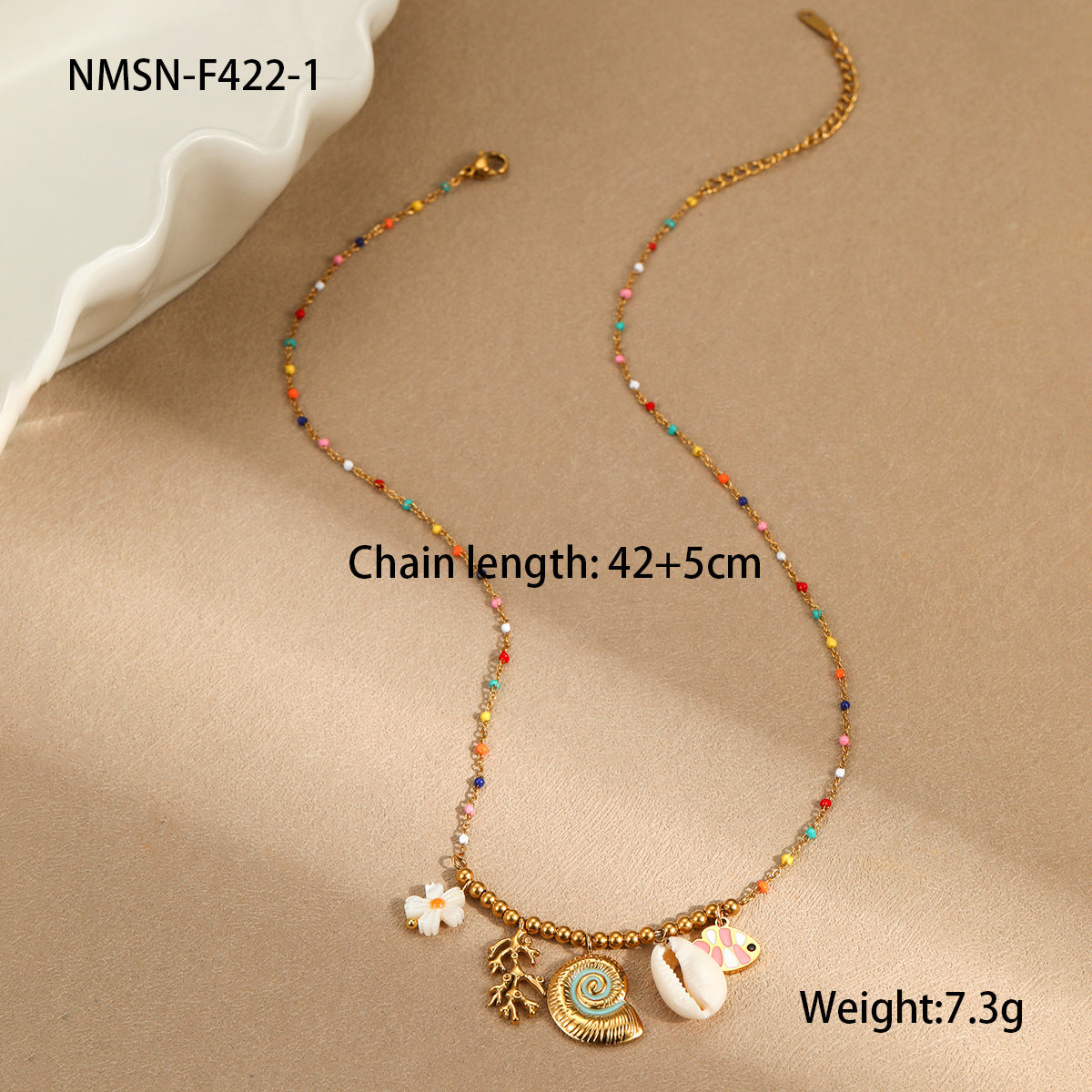 Collana da donna alla moda a tema oceano, con conchiglie e stelle marine, in acciaio al titanio placcato oro 18 carati