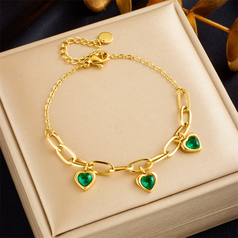 Bracciale a catena irregolare minimalista con ciondolo a cuore intarsiato di strass in acciaio inossidabile placcato oro da donna