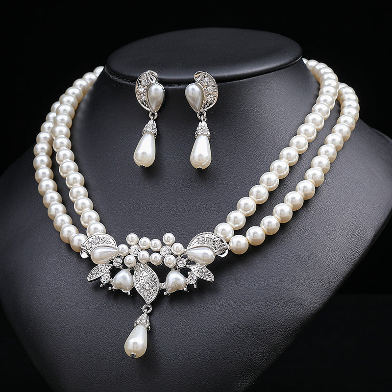 Set di collana e orecchini floreali ispirati a Chanel per donna con lega placcata oro, catena di perline e motivi botanici tra cui grano, petali, foglie e silhouette di alberi