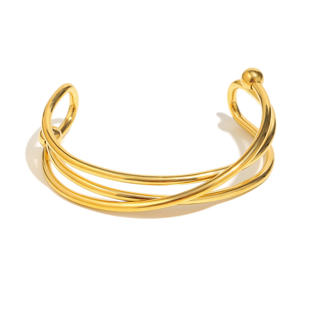 Bracciale da donna in acciaio inossidabile placcato oro 18 carati con design geometrico a linea incrociata, stile minimalista