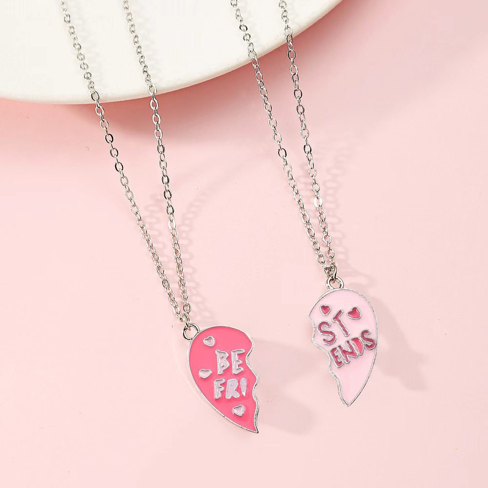 Lindo collar con dije de Stitch de dibujos animados para niños en aleación con acabado de esmalte y dije en forma de corazón en cadena cruzada