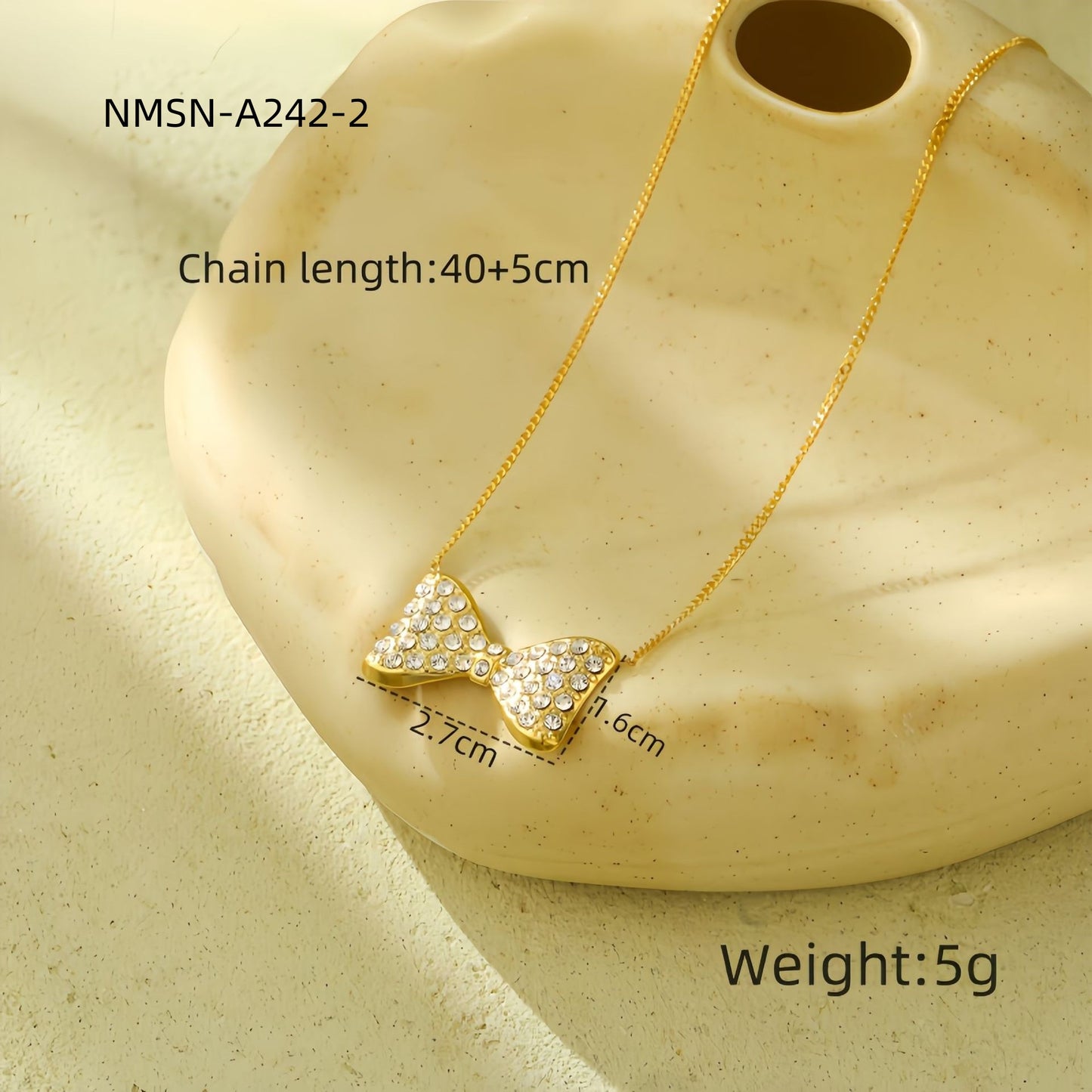 Set di orecchini, collana e anello da donna in acciaio al titanio a forma di fiocco, stile lussuoso, con finitura placcata