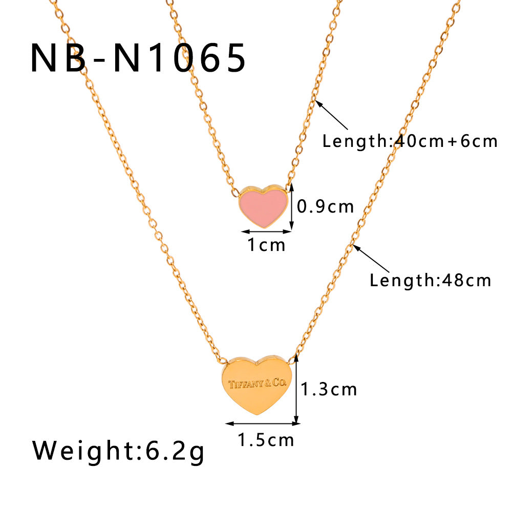 Collana da donna a doppio strato minimalista a forma di cuore in acciaio al titanio con lettere smaltate e placcatura in oro
