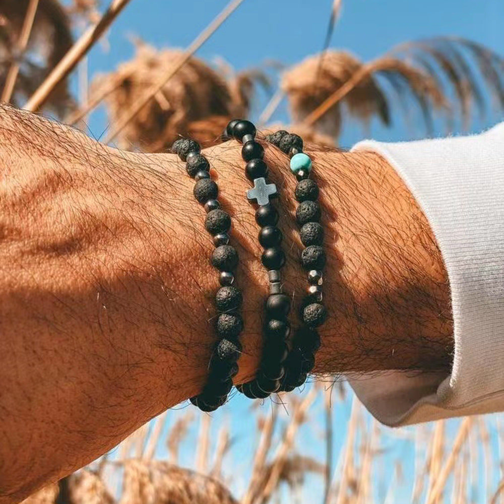 Bracciale Unisex con Perline Turchesi e in Porcellana, Perle in Legno e Ciondolo a Croce Geometrica