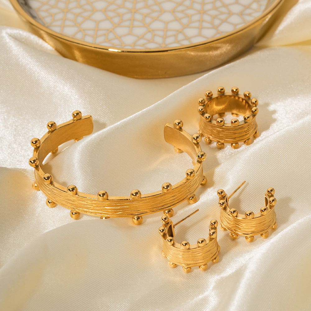 Orecchini a cerchio da donna, alla moda, placcati in oro 18 carati, in acciaio inossidabile, con grana del legno, a forma di C, geometrici e increspati