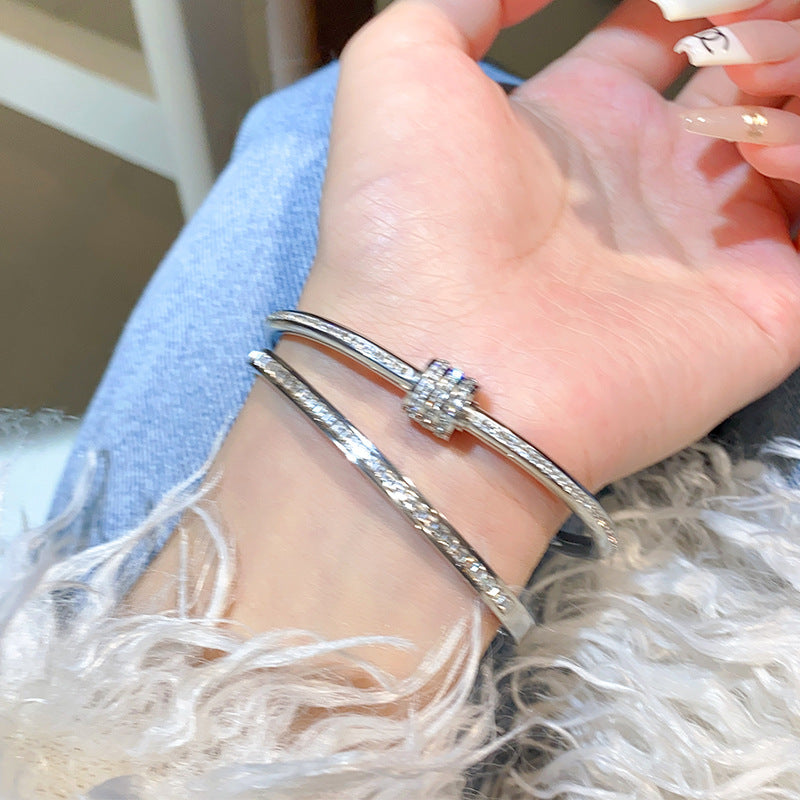 Minimalist Elliptical Titanium Steel Bracelet with Plating Finish for Women Elegant Lightweight Luxury Bangle