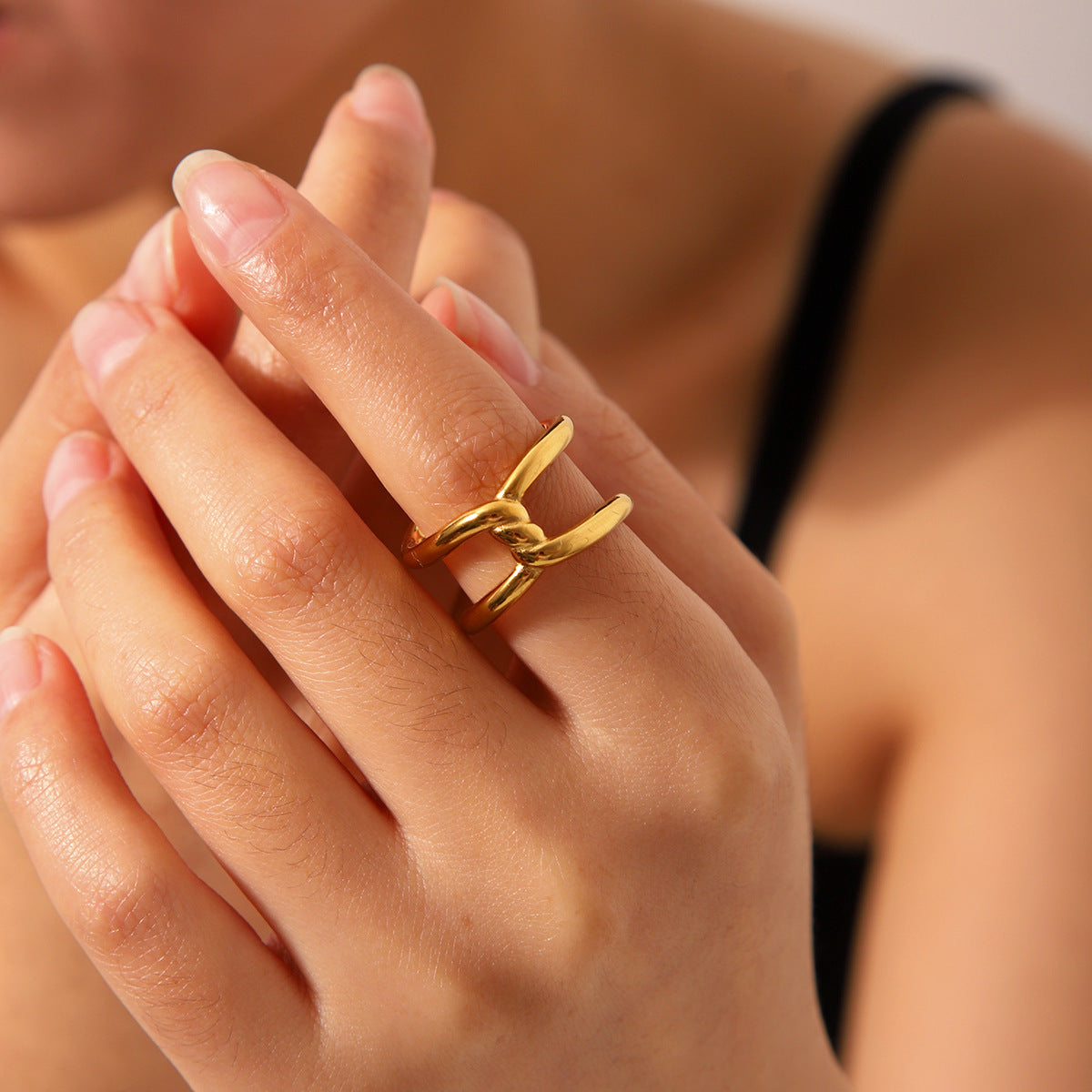 Geometric Hollow Titanium Steel Ring with Gold Plating and Knot-Cross Design for Women