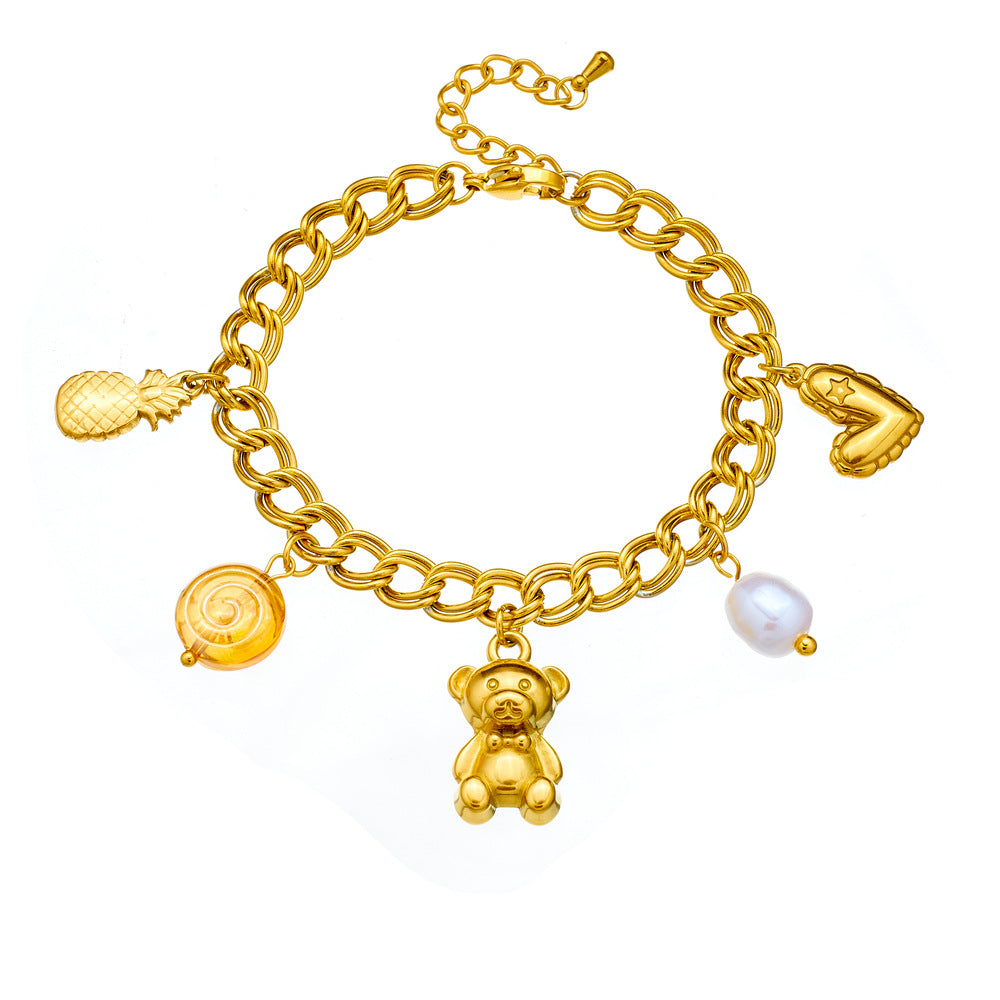 Elegante pulsera de acero inoxidable chapada en oro con doble círculo, colgante de corazón, piña u oso y detalles de perlas