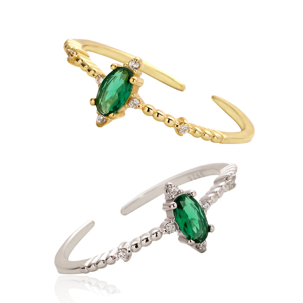 Anello di lusso elegante geometrico placcato in argento sterling 925 con zirconi cubici color smeraldo, rotondo, ovale, design aperto da donna