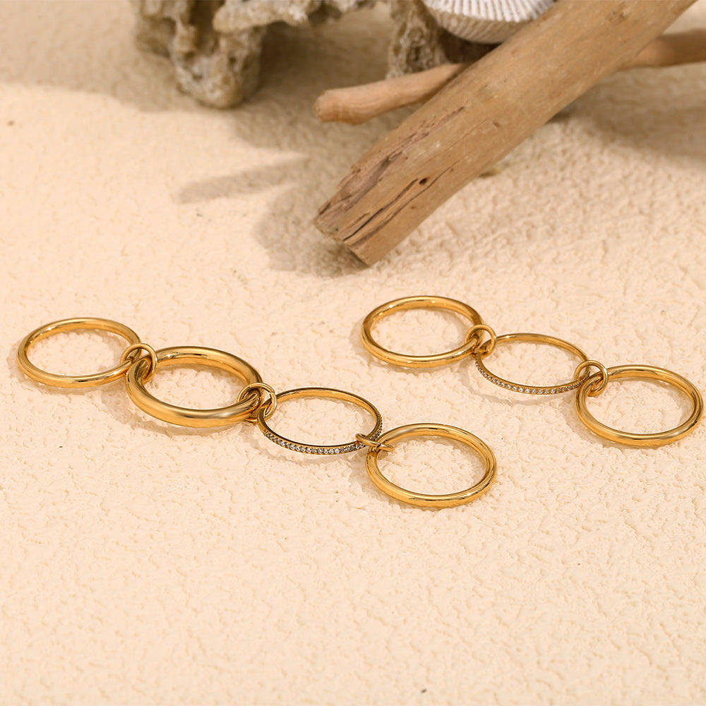 Anello in acciaio inossidabile geometrico creativo con placcatura in oro 18 carati e strass centrale da donna