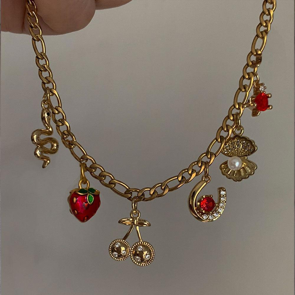 Collana da donna con ciondolo floreale a cuore a goccia in ottone placcato