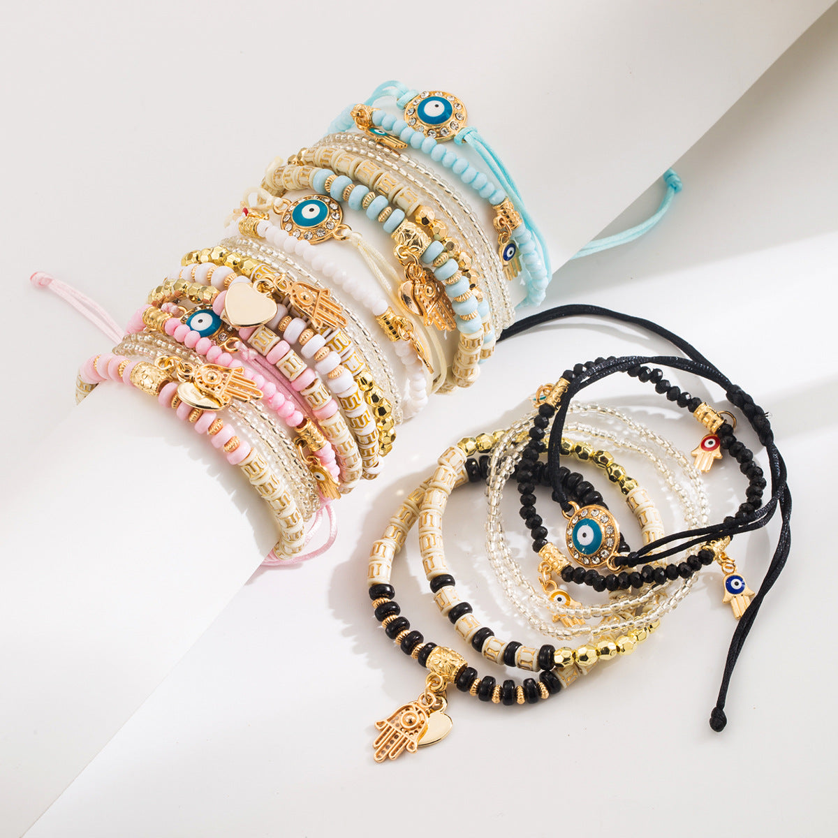Set di bracciali multistrato esotici con perline infilate a mano, con design a forma di occhio in lega e perline di conteria per donna