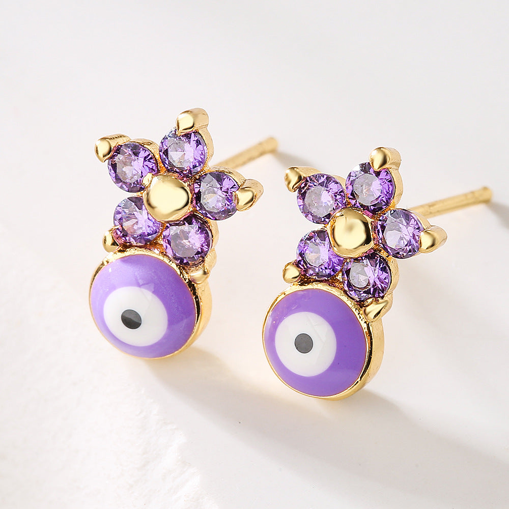 Orecchini a perno geometrici minimalisti a forma di occhio di Hamsa da donna con finitura in smalto e zirconi cubici