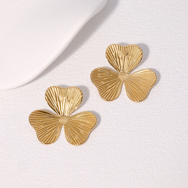 Orecchini a perno floreali minimalisti in acciaio inossidabile da donna con placcatura in oro, design unico e sobrio