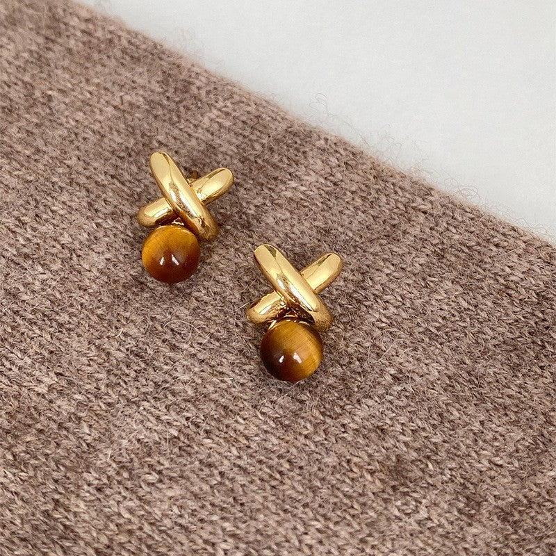 Pendientes de botón de acero chapado de estilo lujoso con perlas de imitación y detalles de ojo de tigre con diseño floral para mujer